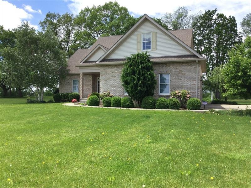Beautiful all brick home on over 3 country acres.