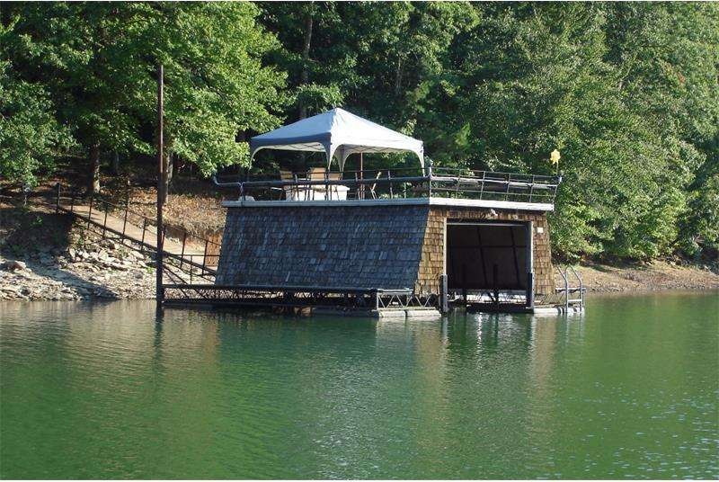 Cedar Shake single slip dock with party deck view 