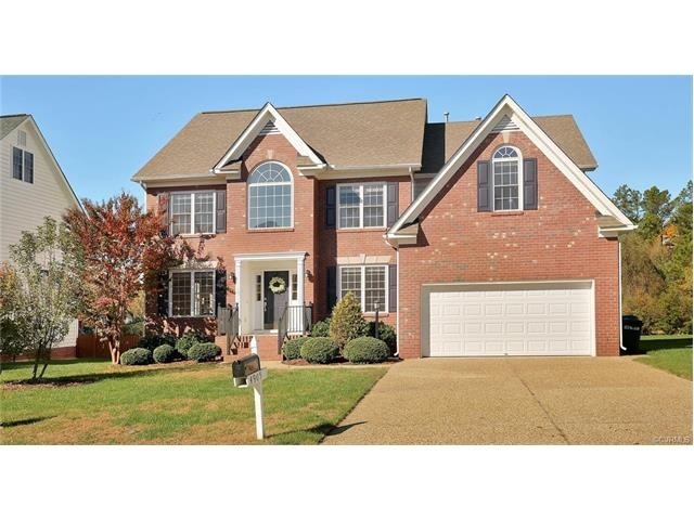 Beautiful, brick-front transitional on a cup-de-sa