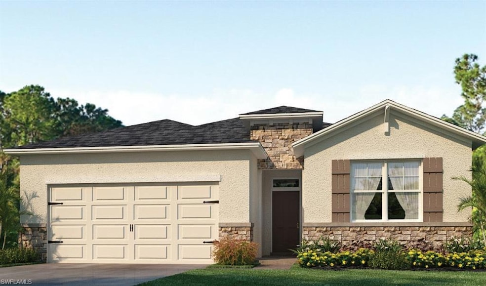 View of front facade featuring a garage