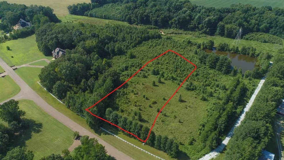 Drone / aerial view featuring a rural view and a w