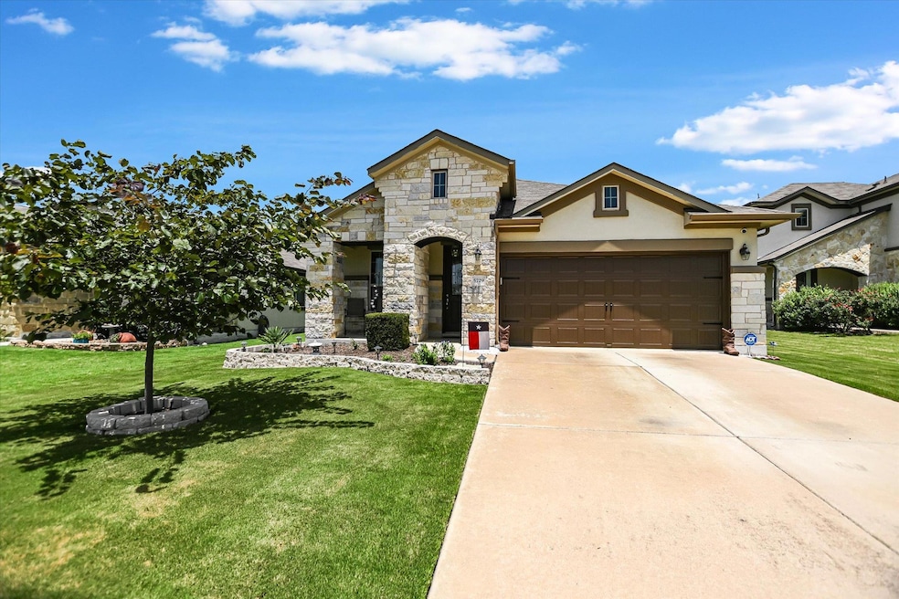 French country style house featuring stone siding