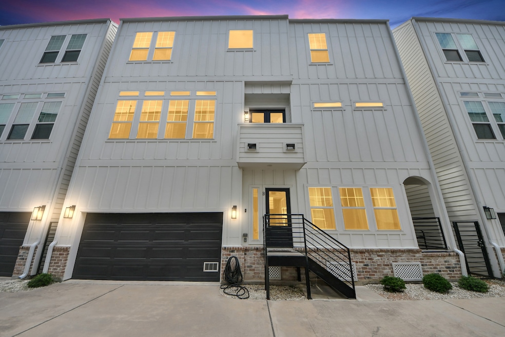 Modern three-story townhouse with a stylish facade