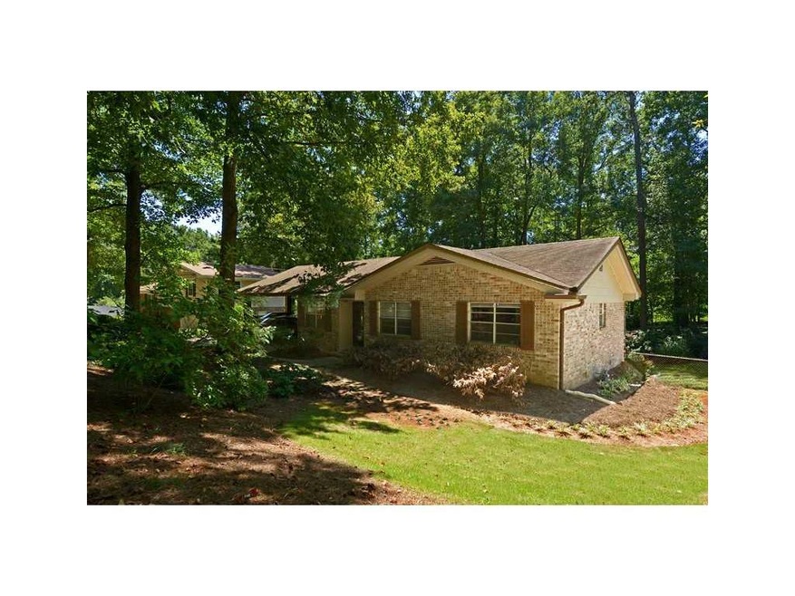 Exterior Front. Charming 4-sided brick home on cor