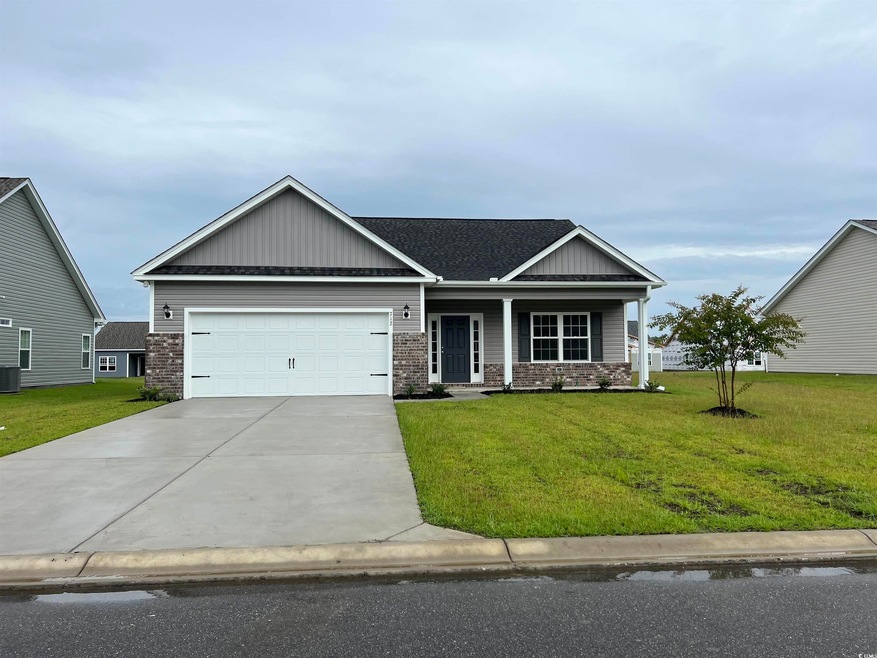 Craftsman house featuring a garage, central air co