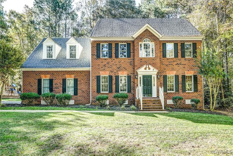 Front of house, brick colonial design