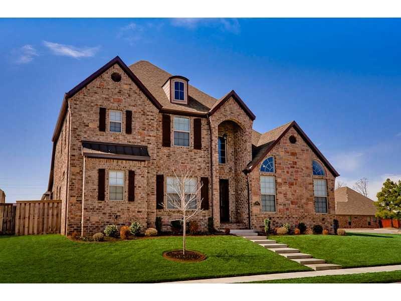 Exterior Front. Exterior lights are on programmable timers,  pre-wired roofline outlets for Christmas lights.