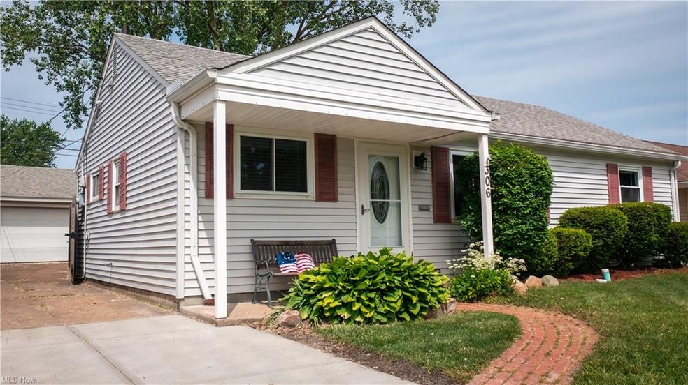 306 Thelma Dr, Sheffield Lake, OH 44054 - photo 1