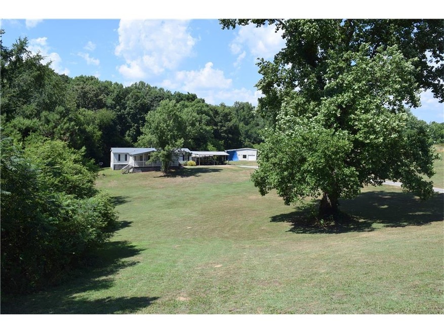 568 Marshall Clark Rd, Hoschton, GA 30548 - photo 1