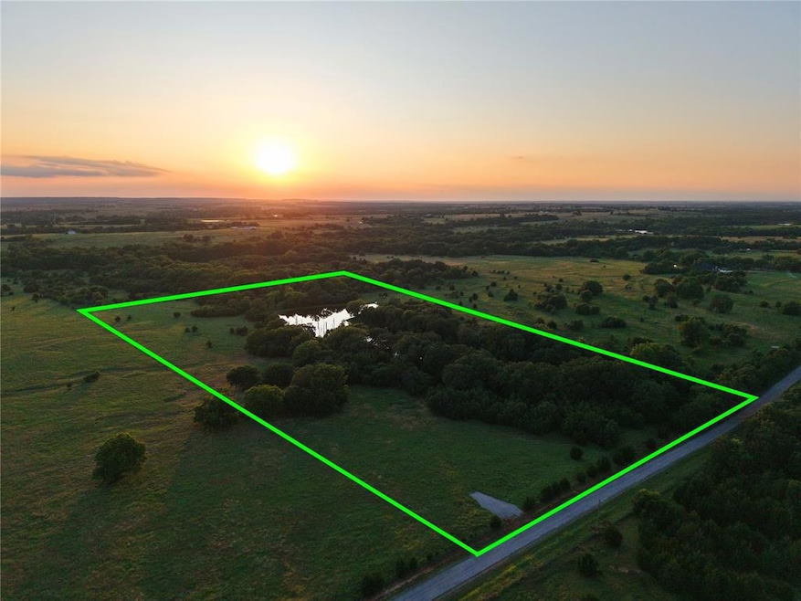 Aerial view of sparsely populated area with property boundaries highlighted