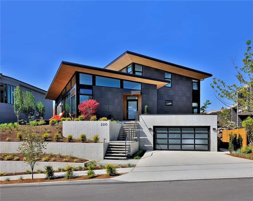 Contemporary home featuring a garage
