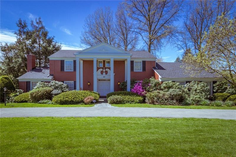 This 4 bedroom 3.5 bath all brick plantation style
