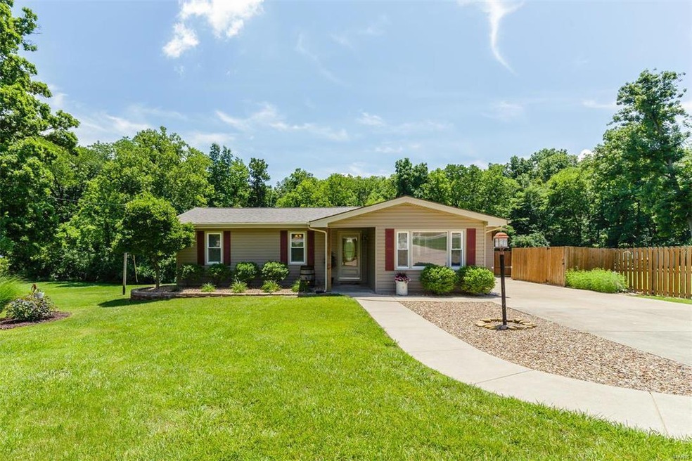 Absolutely adorable 3 bed home on .93 acres with a