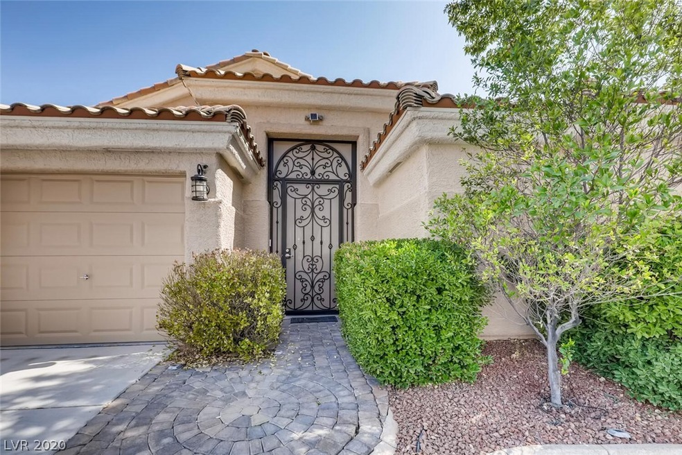 Custom privacy entry gate to welcoming courtyard