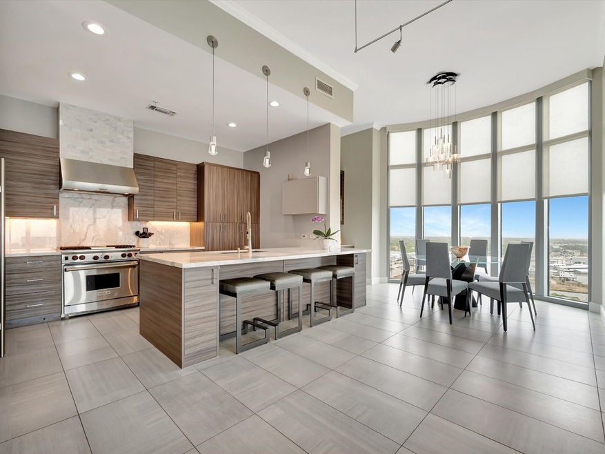 The spacious kitchen island not only provides ampl