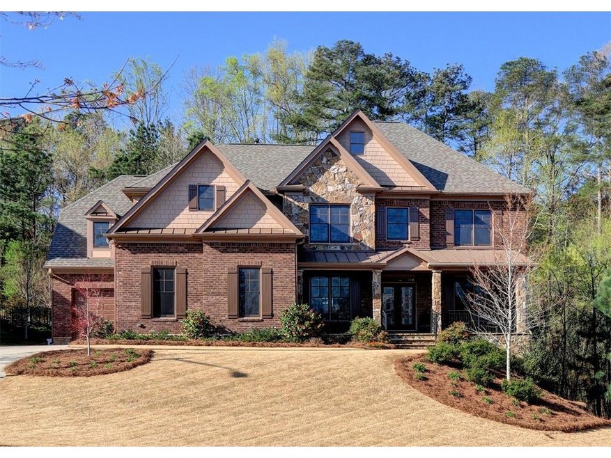 Nearly new shingle, brick, and stone Craftsman-sty