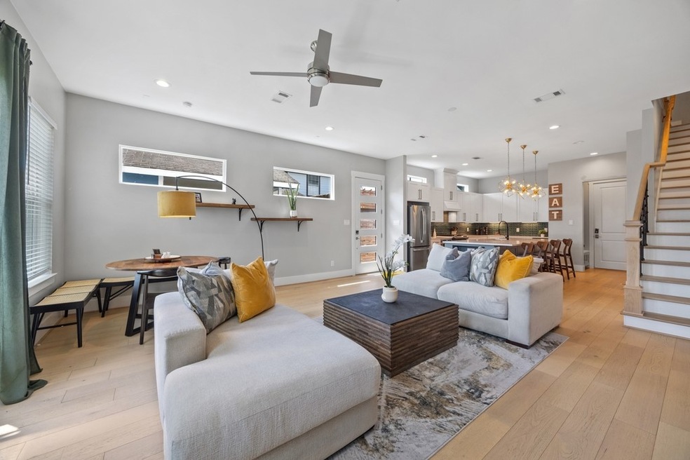 Spacious open-concept living room with modern fini
