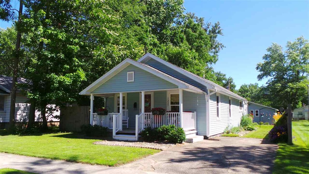 This charming home with a full sized front porch i