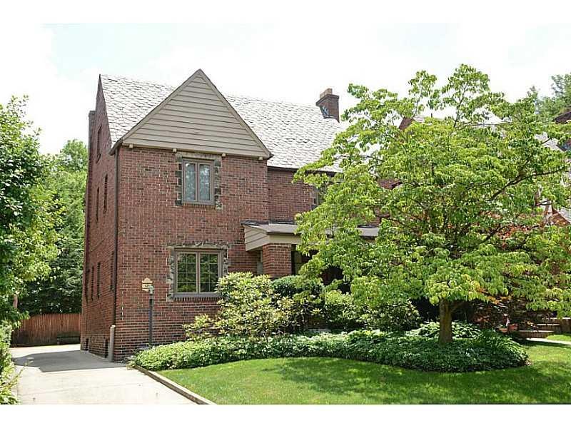 Exterior Front. Classic brick Tudor