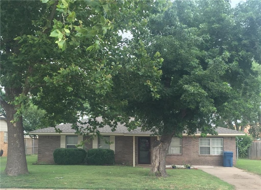Front Exterior with mature trees for shade.