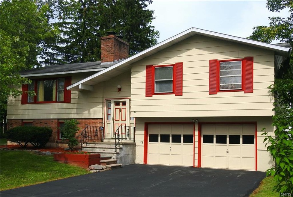 Raised ranch with two car garage!