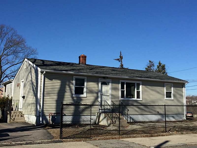 Exterior Front. New vinyl siding, new roof, new wi