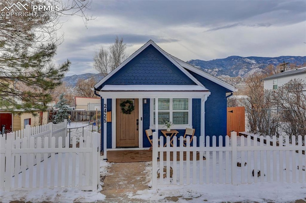 View of front of house with a mountain view