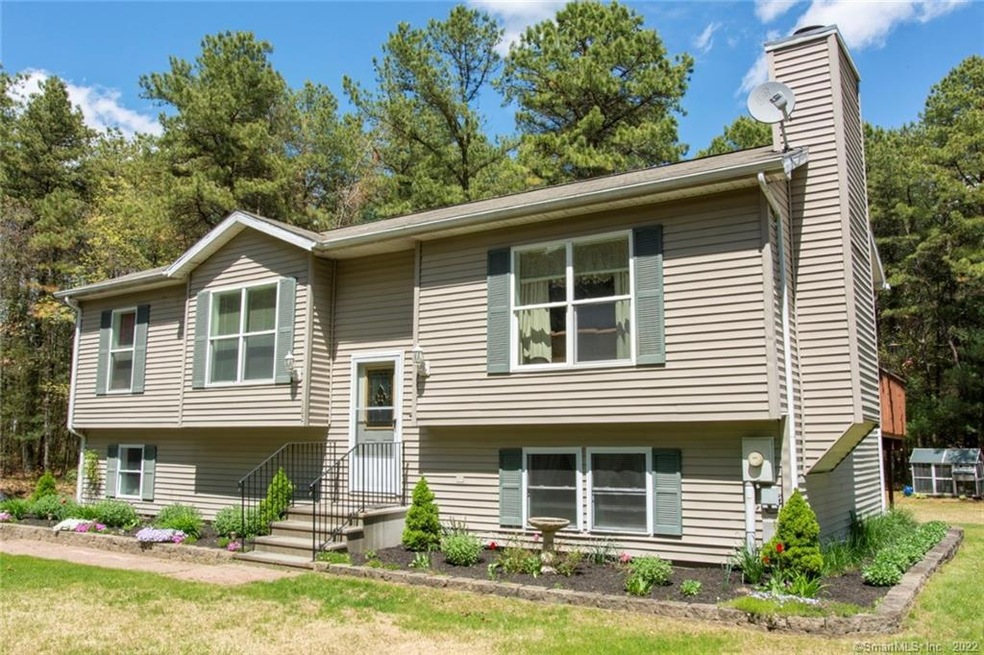 Classic Raised Ranch with Wood Burning Fireplace..