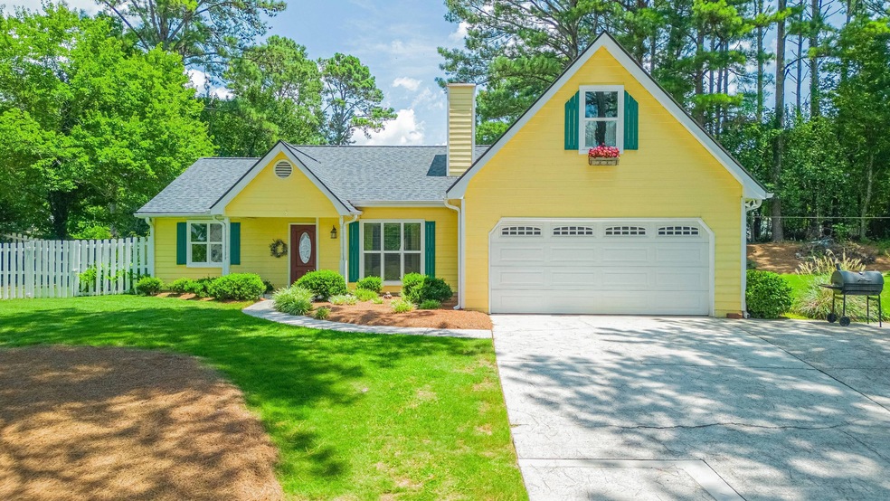 1276 Oak Rd SW, Lilburn, GA 30047 - photo 1