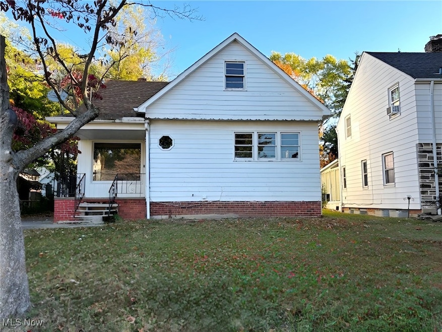 Front view of house featuring a yard