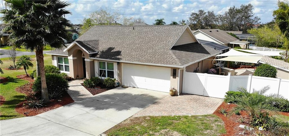 Beautifully Maintained 3/2/2 Corner Lot with Pool 