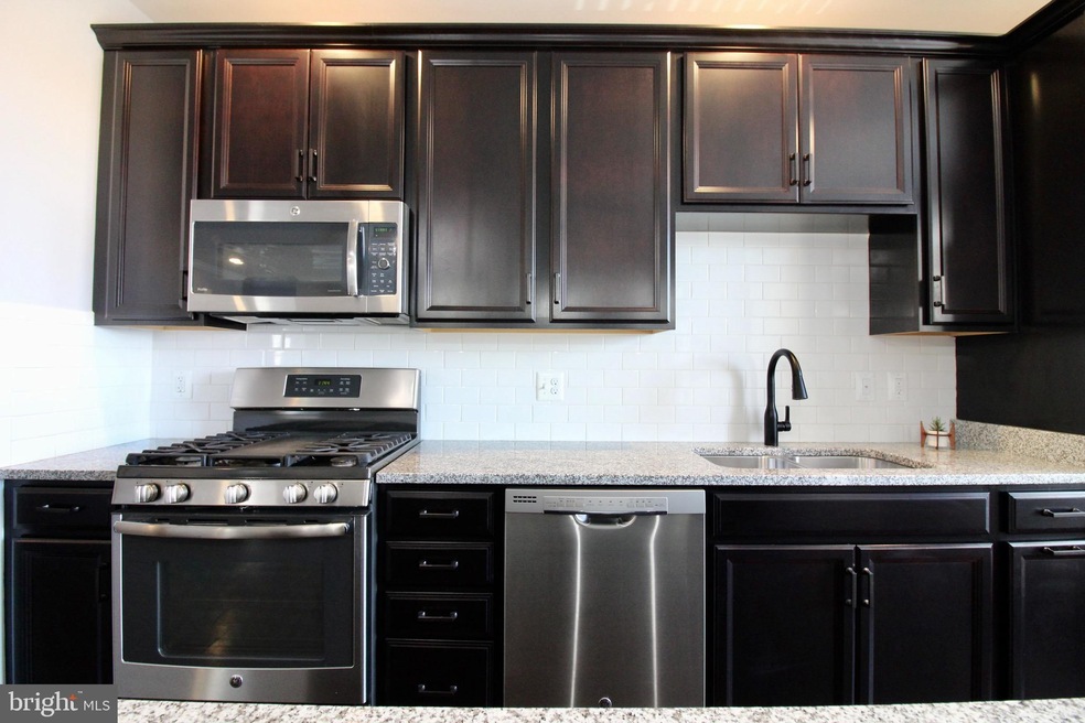 23315 Milltown Knoll Square unit 104, Ashburn, VA 20148 - photo 1