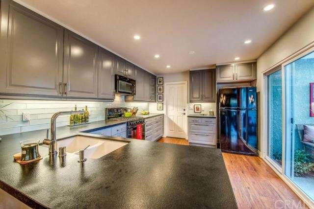 Remodeled Kitchen.  Notice The Custom Black Absolu