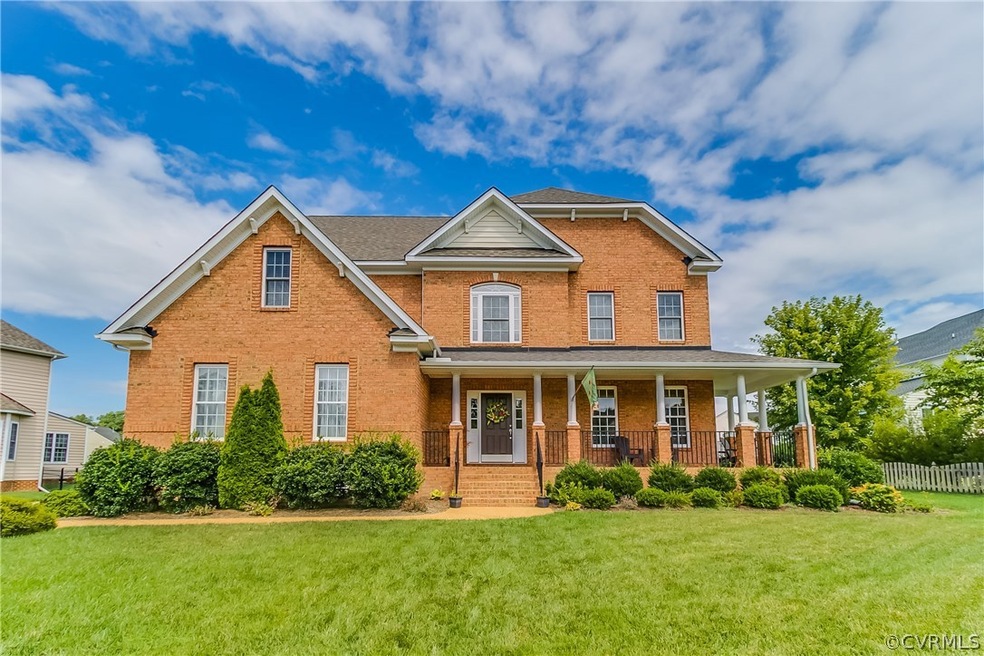 Brick front with distinctive wraparound front porc