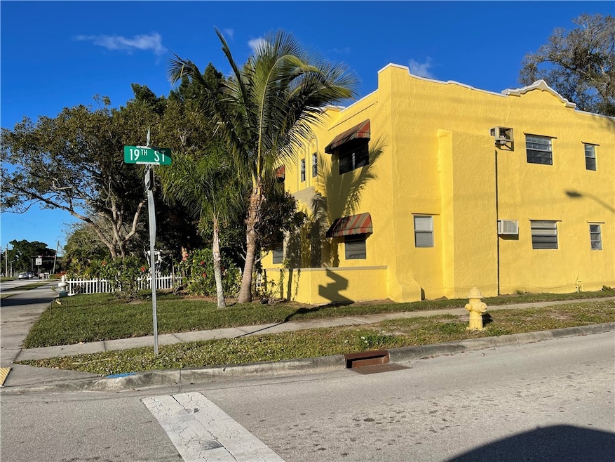 Front and side of 4 unit apartment building