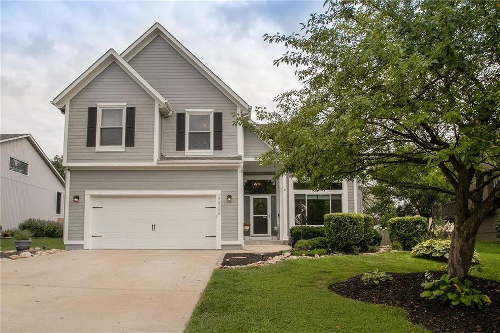 This four bedroom, two full and one half bath home