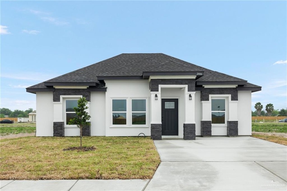 Prairie-style home with a front lawn