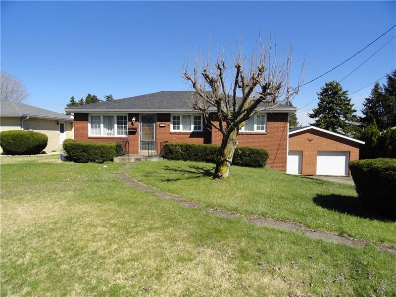 All brick ranch with multi-pane window and updated