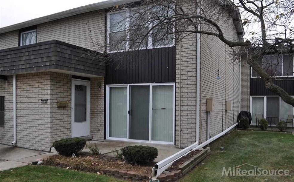 8299 Kennedy Cir unit 4, Warren, MI 48093 - photo 1