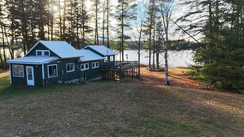 Camp w 2 waterfront lots + 30 Acres