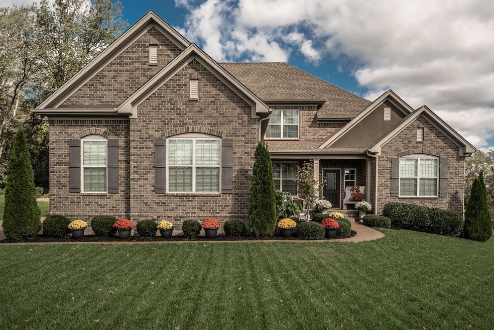 The most perfect yard welcomes you home to 1008 Carlyle Court, Hendersonville TN. 