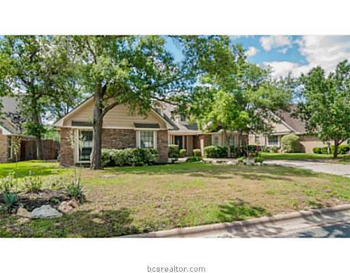 Exterior Front. Established trees and landscaping