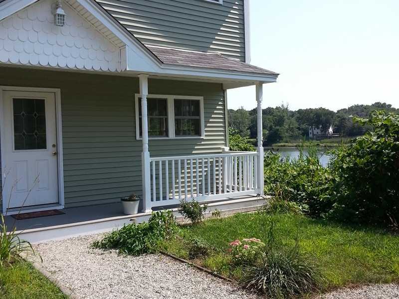 Exterior Front. Waterfront property!