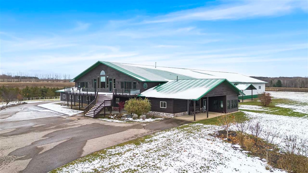 130 S Peninsula Rd, East Jordan, MI 49727 - photo 1