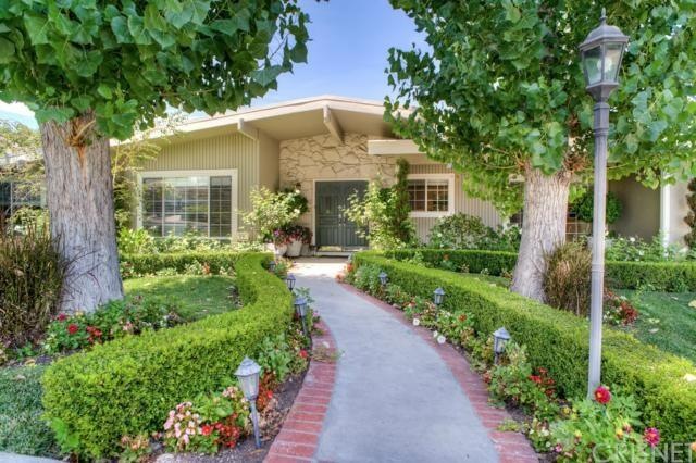 Great Curb appeal with meticulously maintained landscaping.