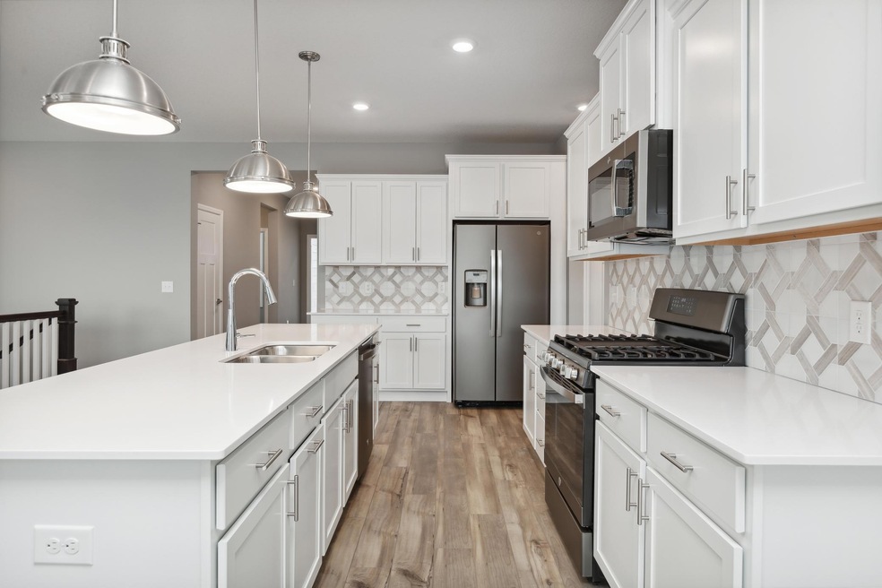 Look at that pop of color this backsplash gives!