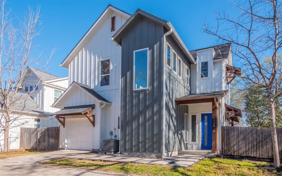 View of front of property featuring cooling unit,