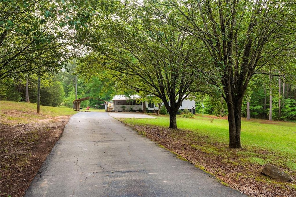 View of road featuring driveway