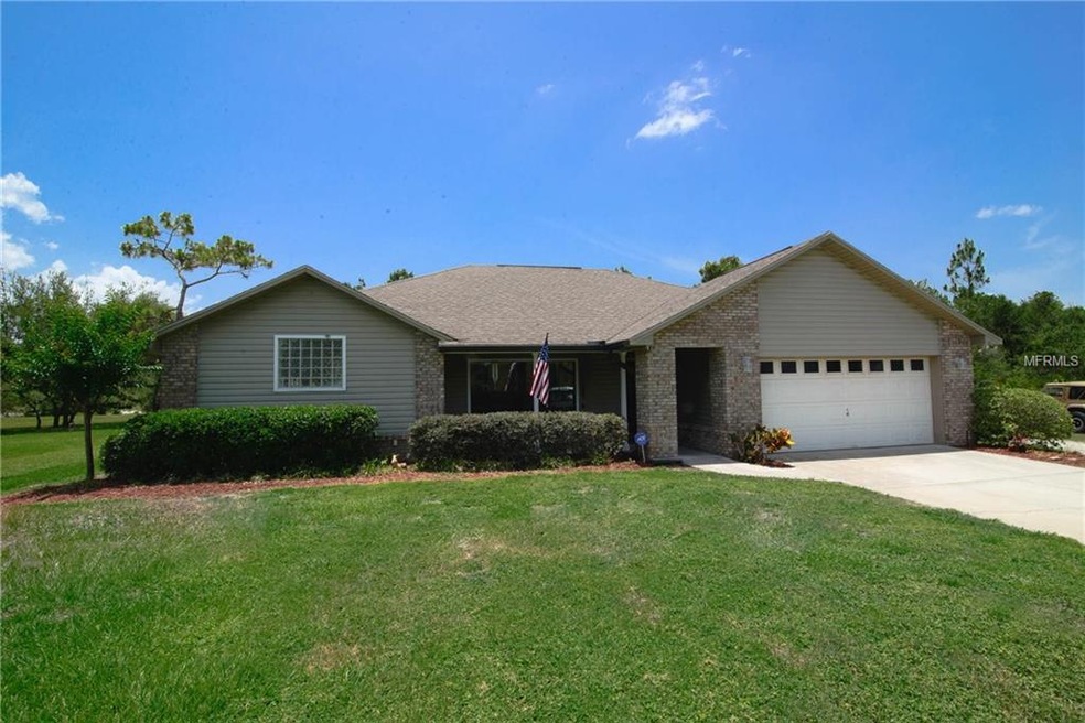 1930 Running Horse Trail, Saint Cloud, FL 34771 - photo 1