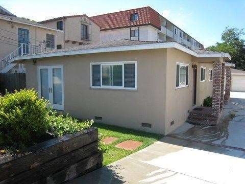 2 two bdrm 1 bath units with 4 garage spaces..refu